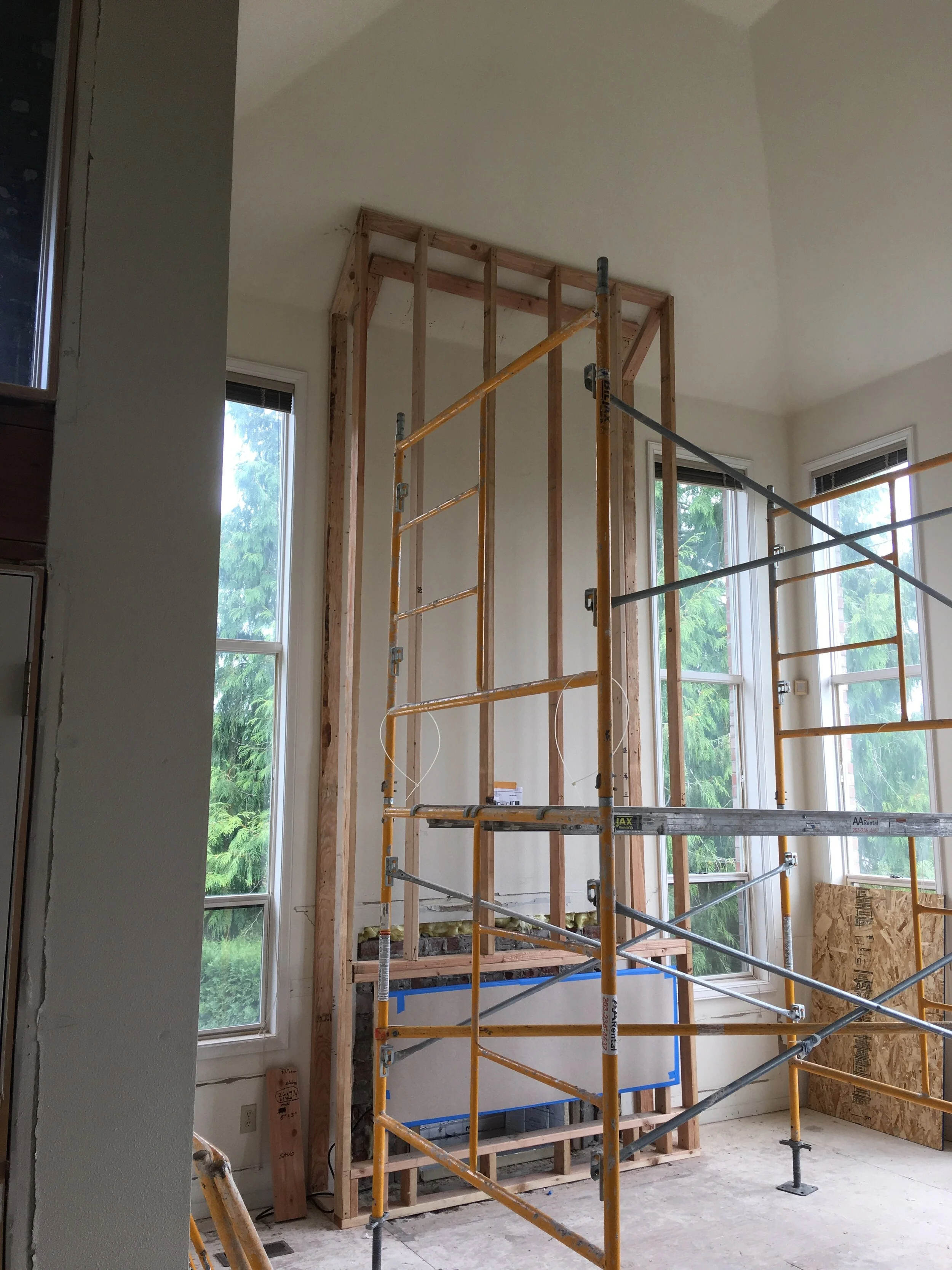 Traditional to Modern Fireplace in progress.JPG