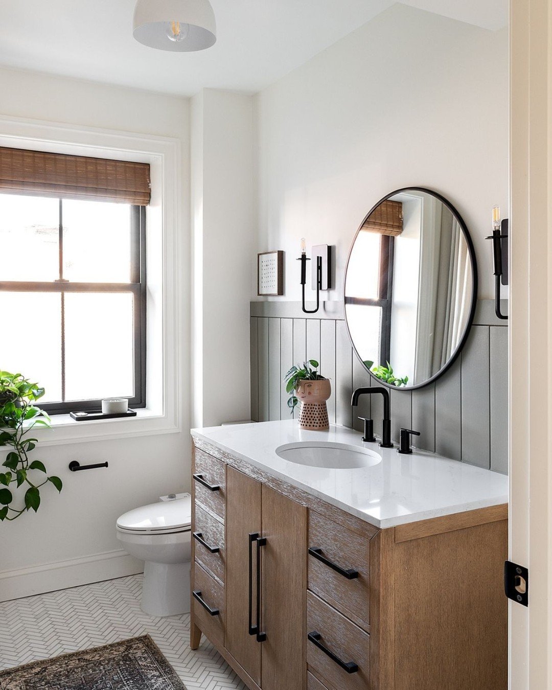 Earthy, soft, and a little bit moody. 🤍

Warm wood, matte black fixtures, herringbone dolomite marble underfoot, and a gray-green accent wall doing quiet but important work. In our Fishtown row home project, we fully renovated and reimagined the who