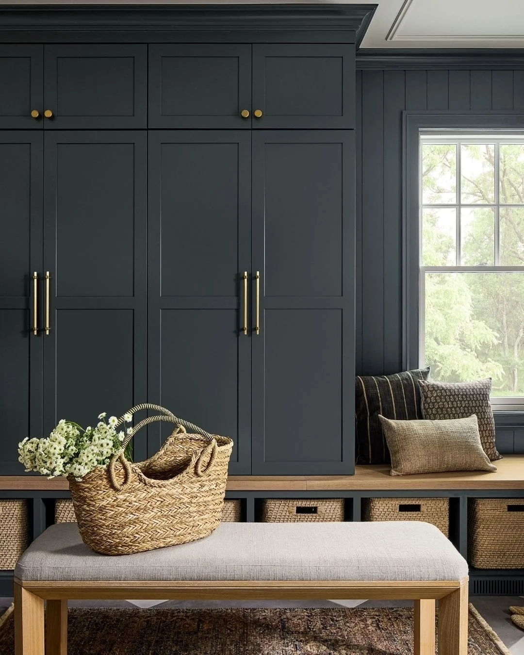 A quiet moment with textiles, textures, and moody color tones in this mudroom project.

Build: @alliancerenovations
Photo: @jakedunderdalephoto 
Styling: @braelynschenk 

#domiciledesignstudio #haddonfielddesigner #phillydesigner #mudroomdesign #phil