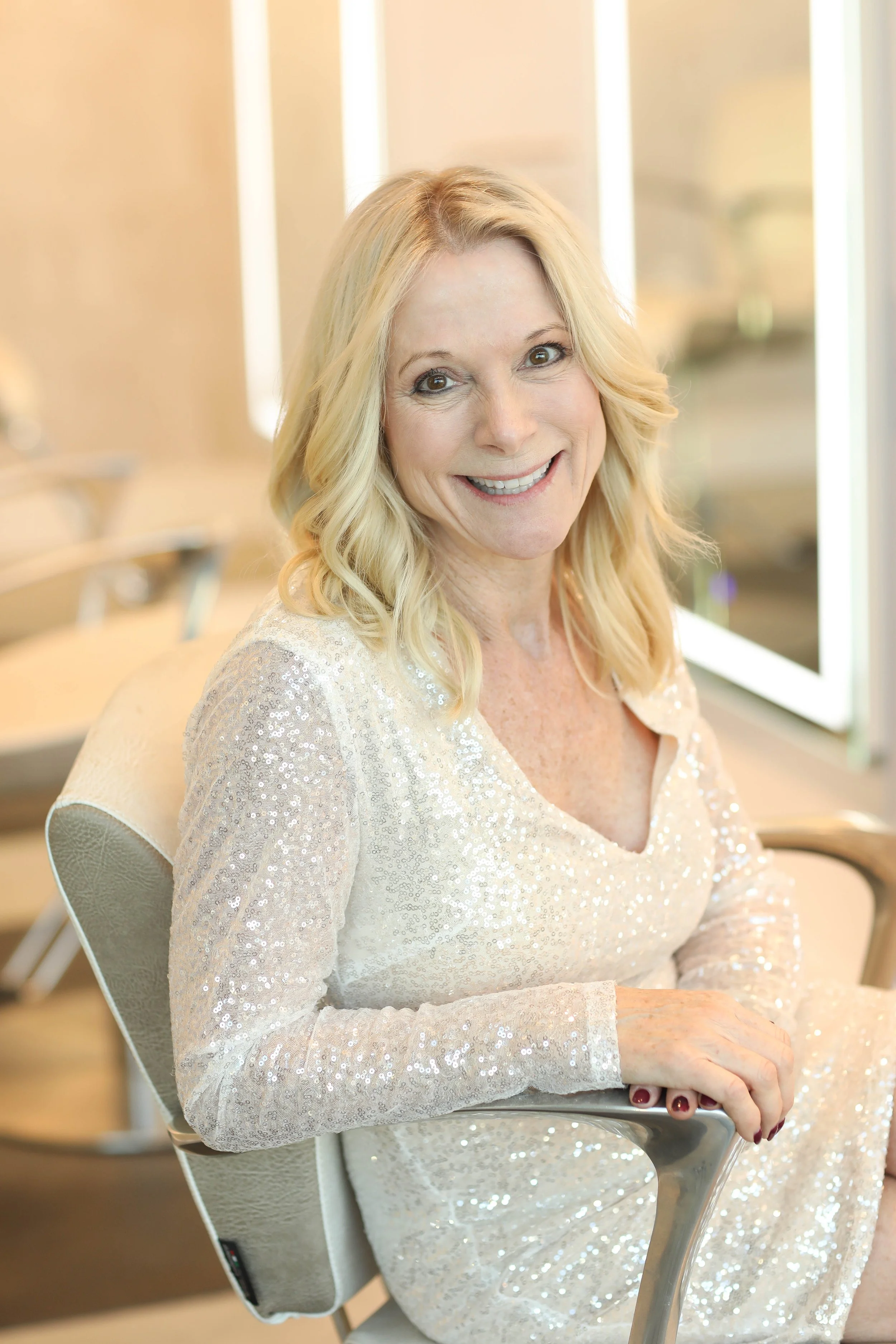 Sharon Sabin, owner of Pure Hair Artistry, an Aveda hair salon serving Peachtree City and South Atlanta.