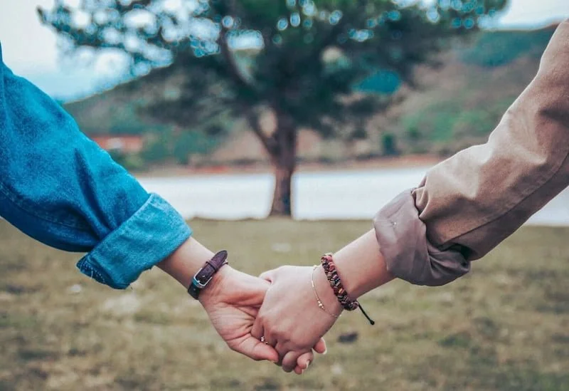 couple holding hands