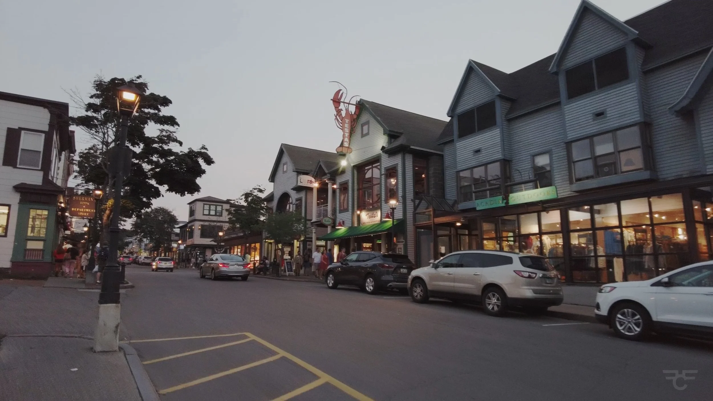 a photo of Bar Harbor's shopping and restaurant area during sunset