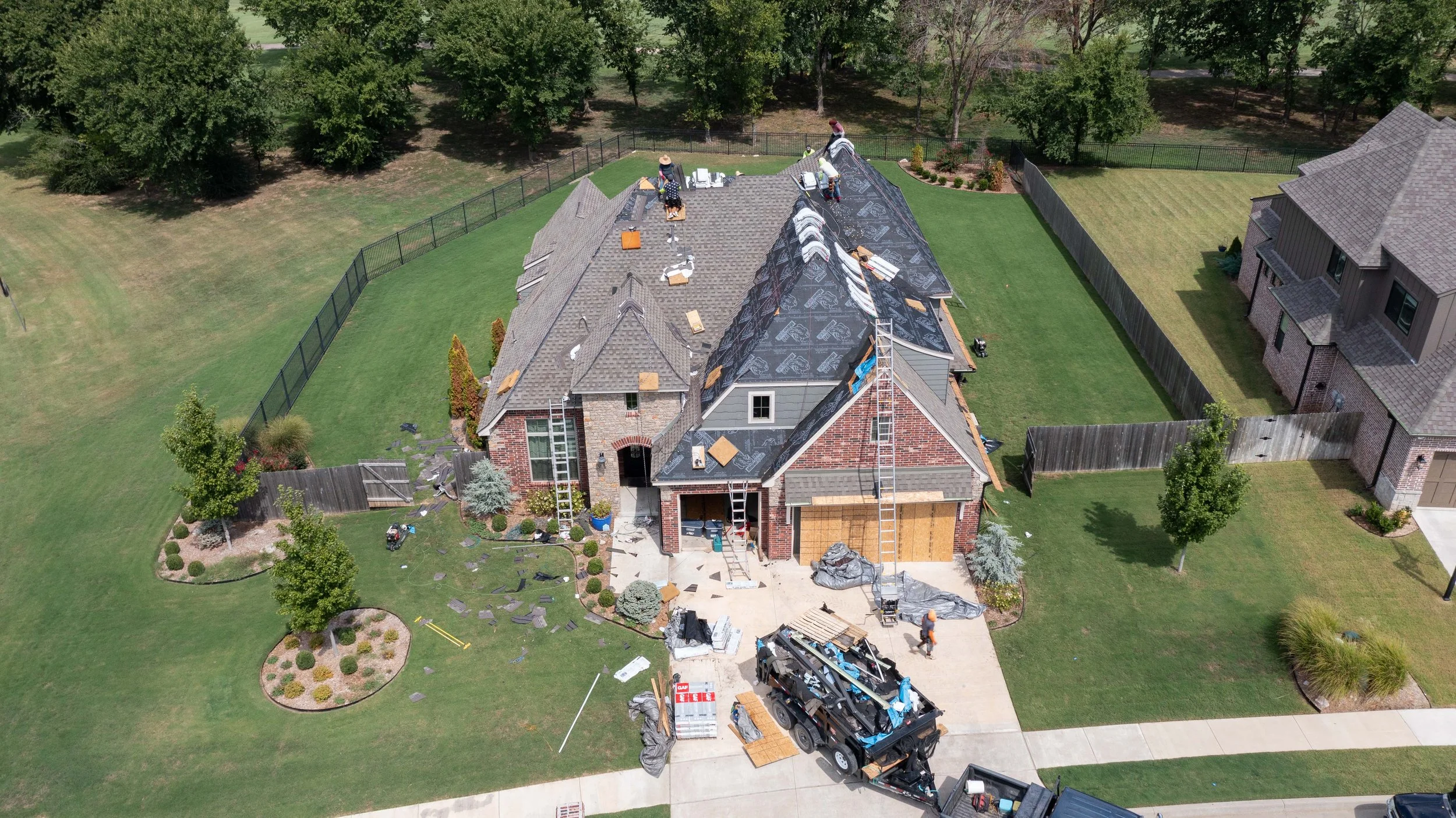 Drone image of a large home in Forest Ridge golf community in Broken Arrow Oklahoma
