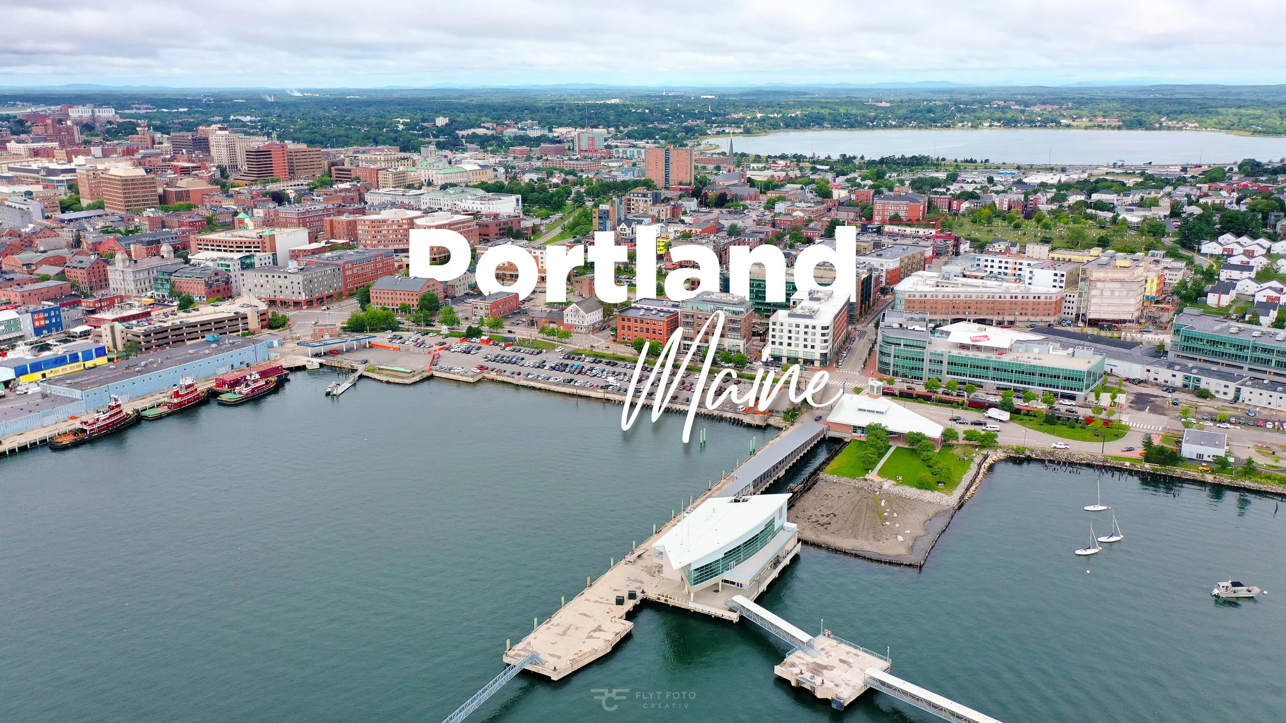 An aerial drone photo overlooking Portland Maine and part of the Atlantic Ocean