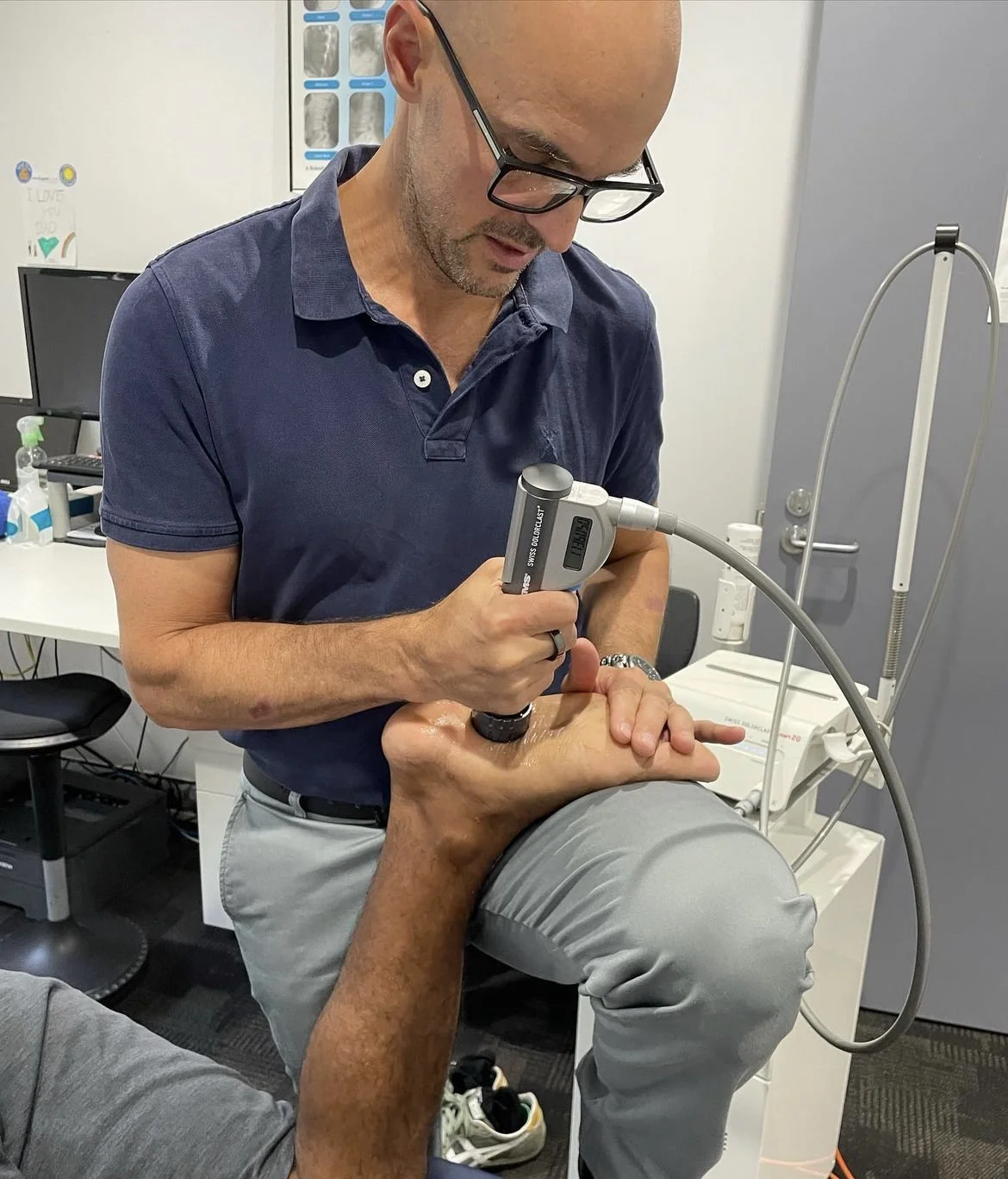 Radial Shockwave Therapy using EMS Swiss DolorClast system at Cammeray Chiropractic & Performance Centre, Sydney, for musculoskeletal rehabilitation