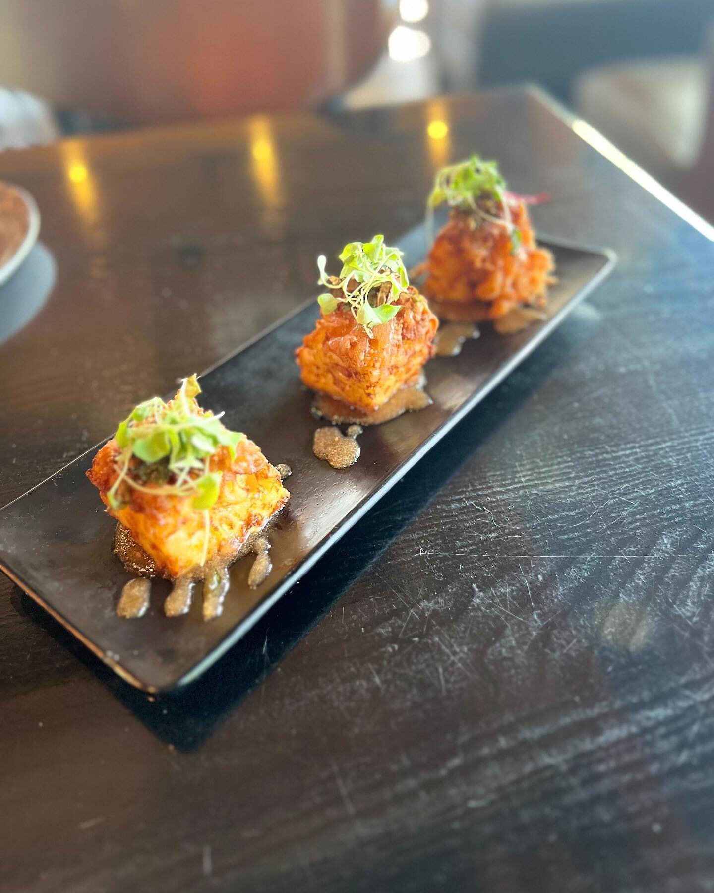 Treat yourself with our Mac &amp; cheese bites 😌Fried pulled pork Mac &amp; cheese stuffed with black eye peas, and braised greens. Topped with fried brussel sprouts and tomato jam 👏🏽