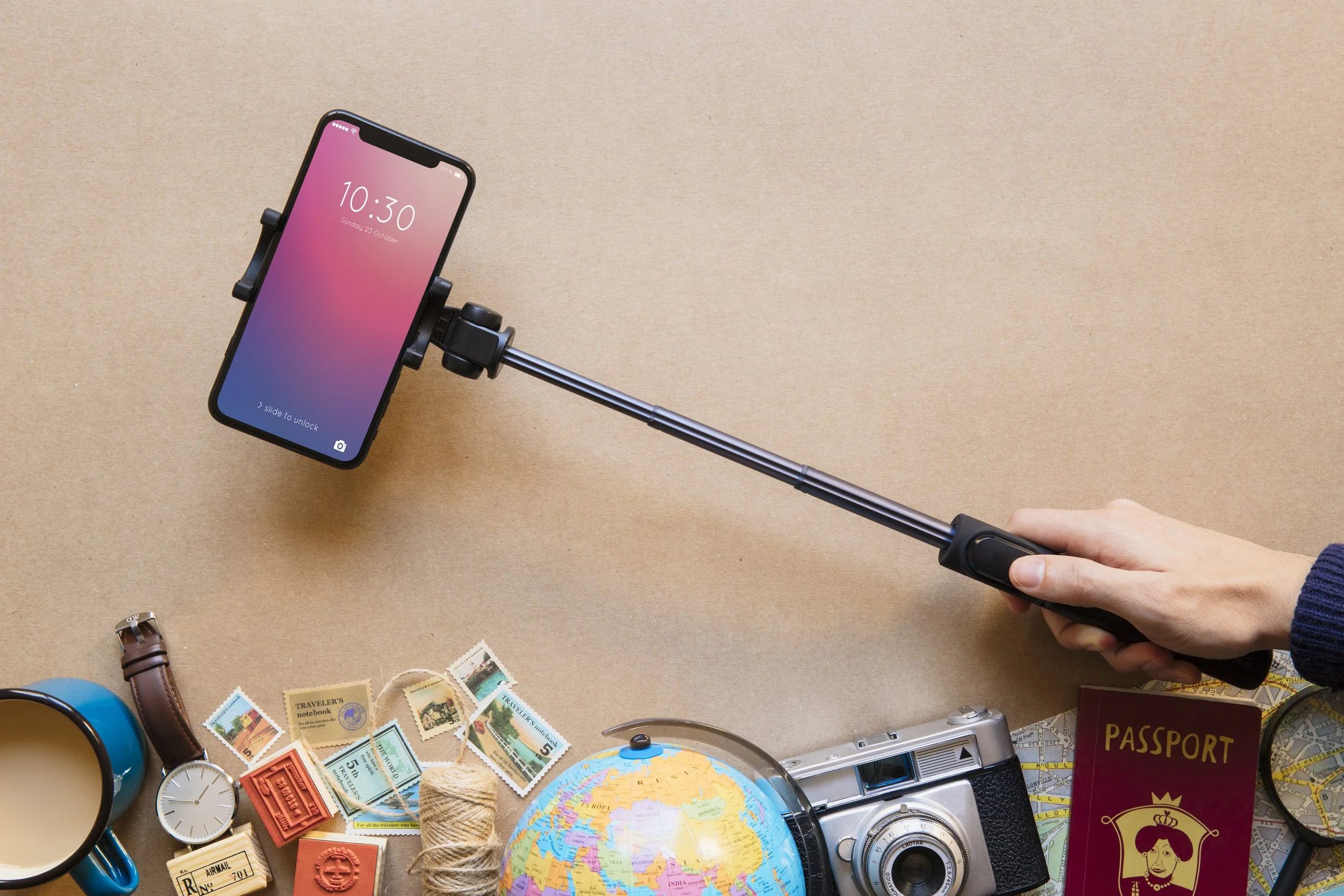 hand-holding-hi-tech-smartphone-monopod.jpg