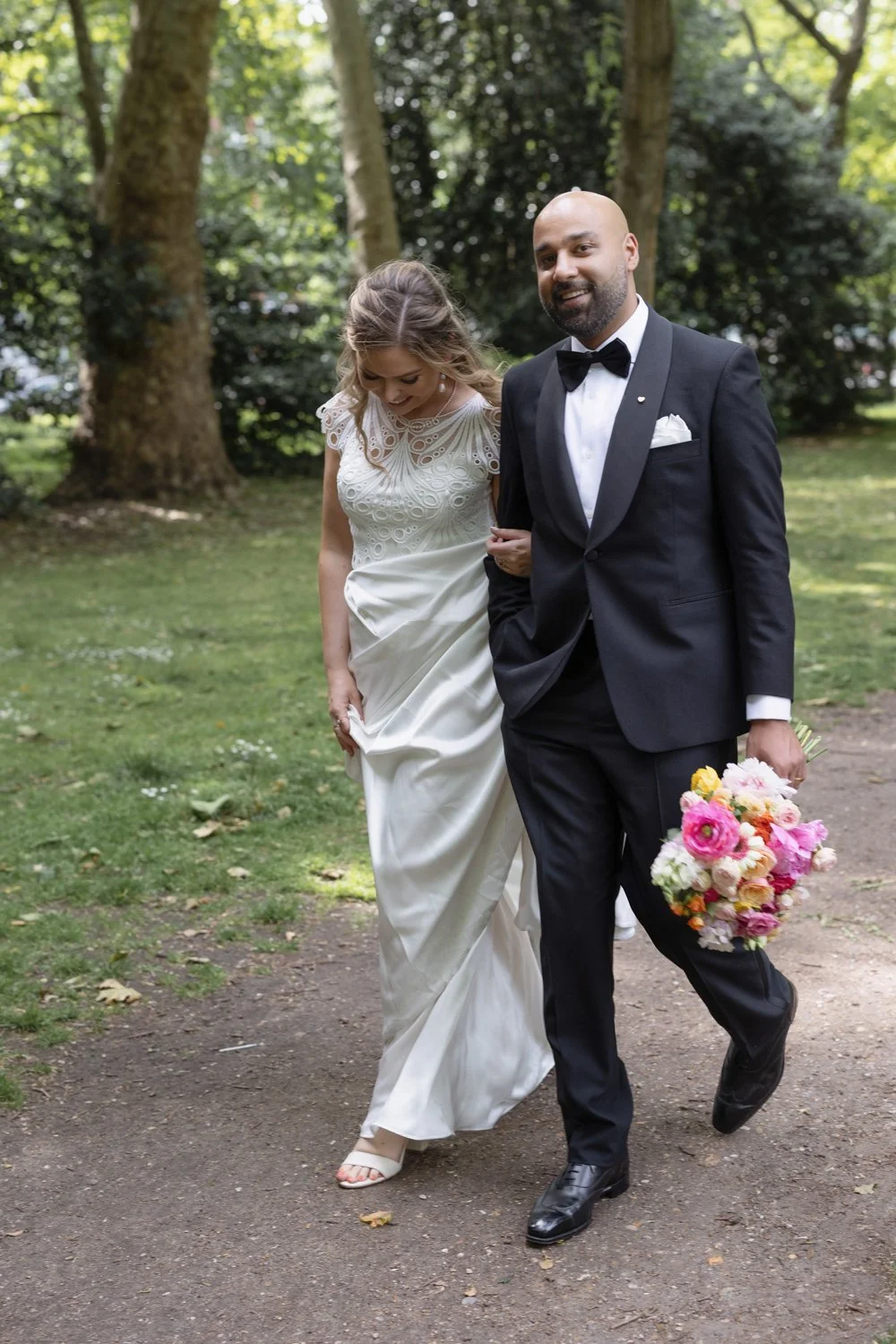 Bride and Groom strolling in Battersea Park