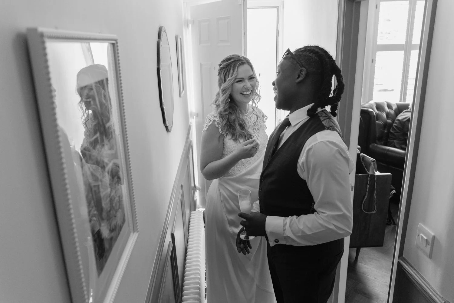 Bride with best friend during prep