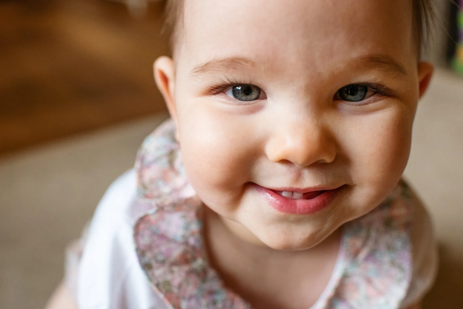 Baby girl looks directly into my camera.