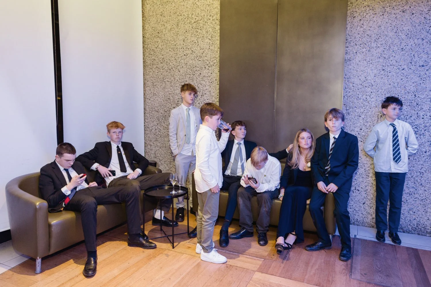Teenagers hanging out during  Barbican Conservatory wedding reception.