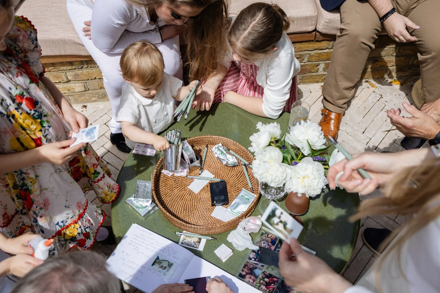 Aerial view of guests playing with small boy reception
