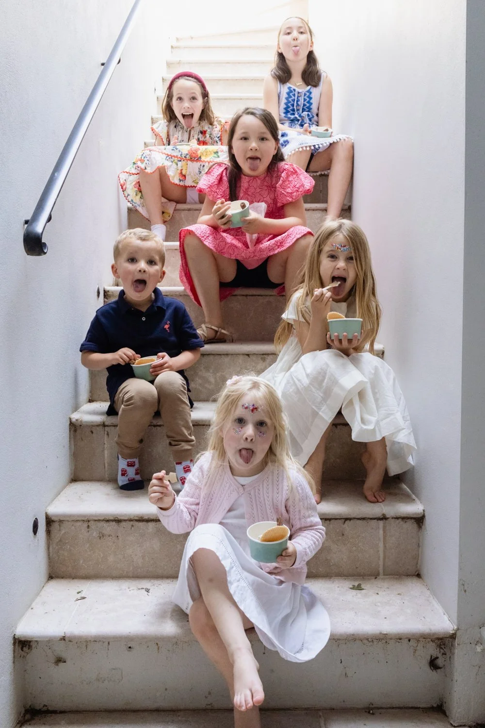 kids eating ice cream on stairs