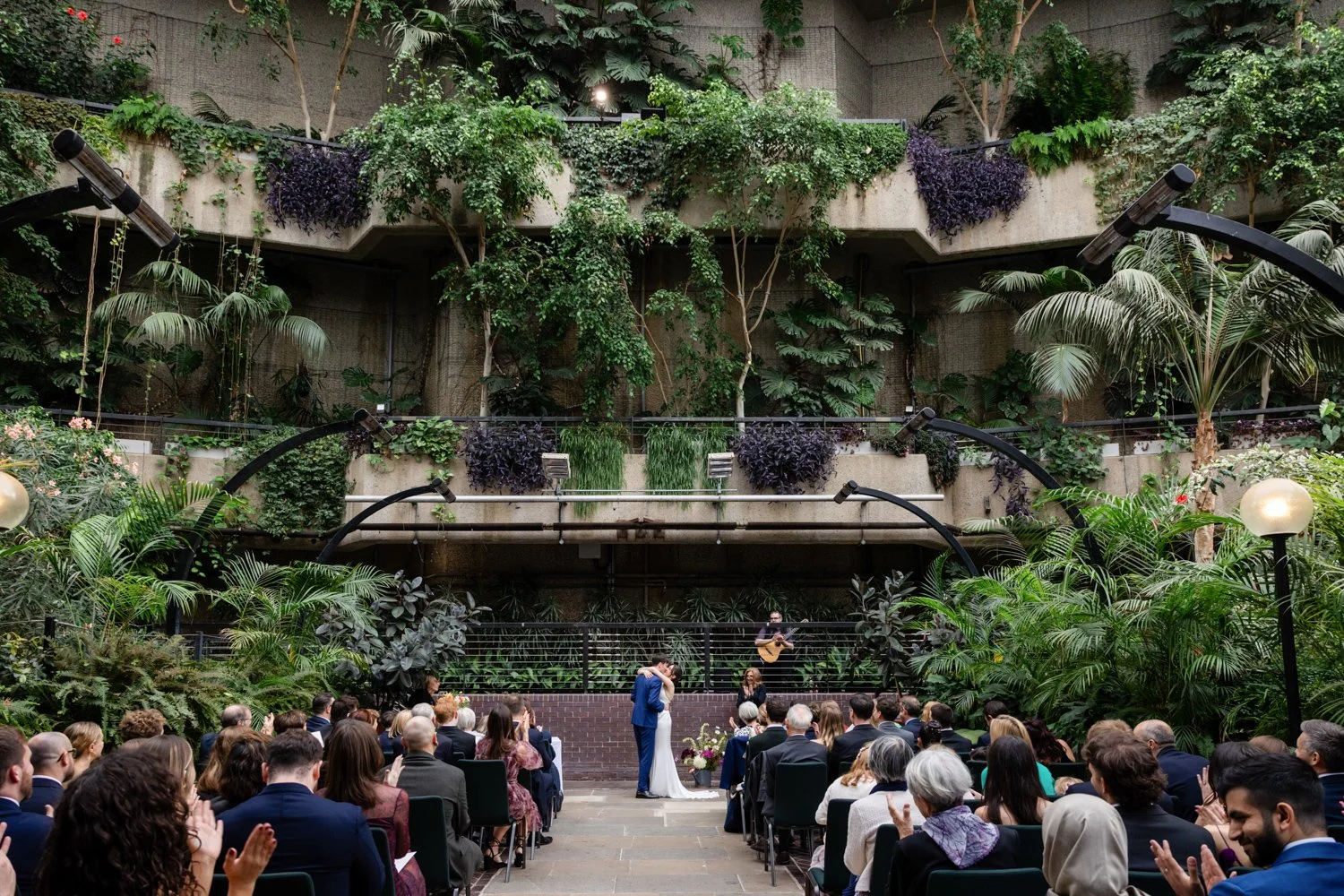 First married kiss in the Barbican Conservatory