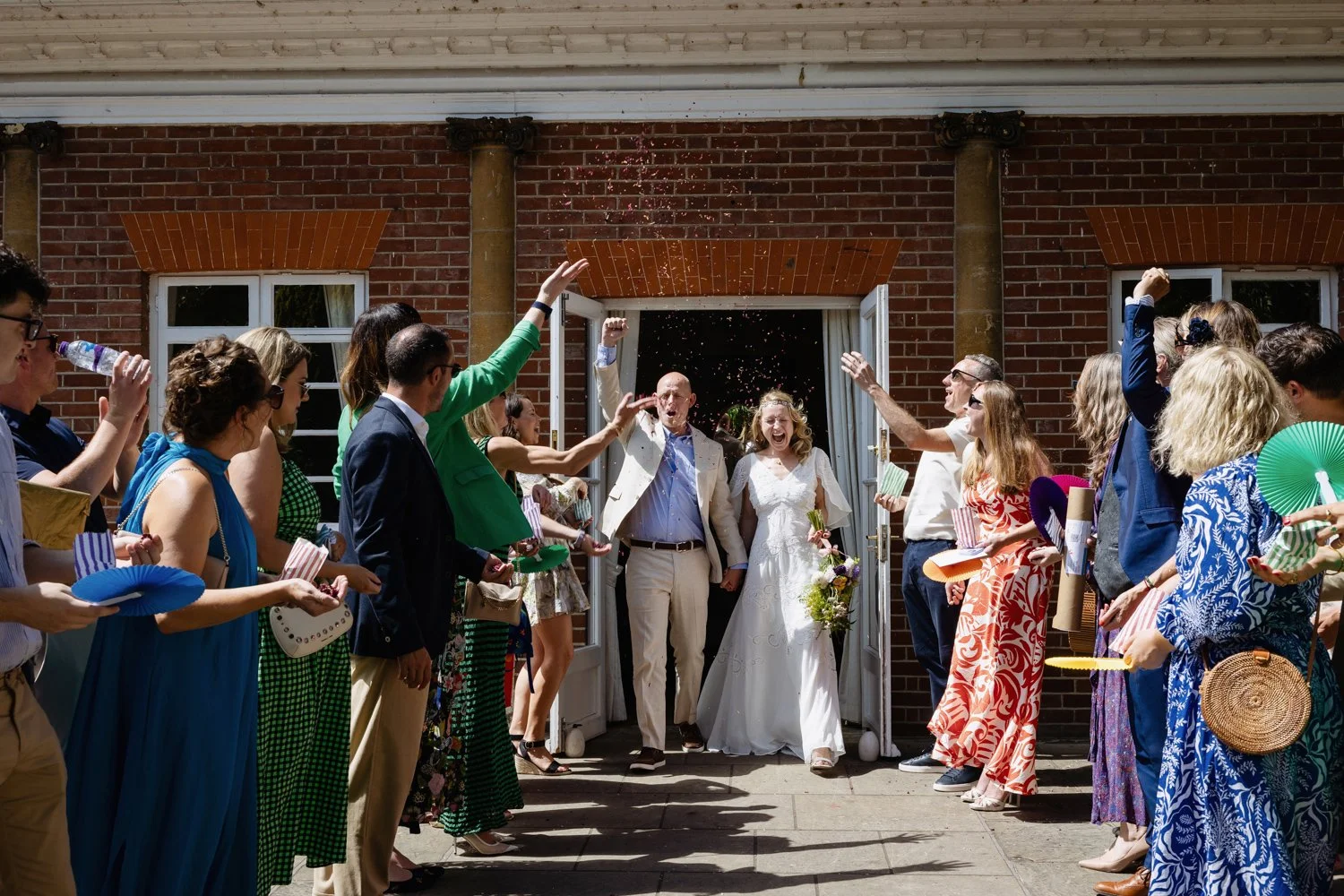 Leaving Loggia Room at York House Twickenham to a shower of confetti.
