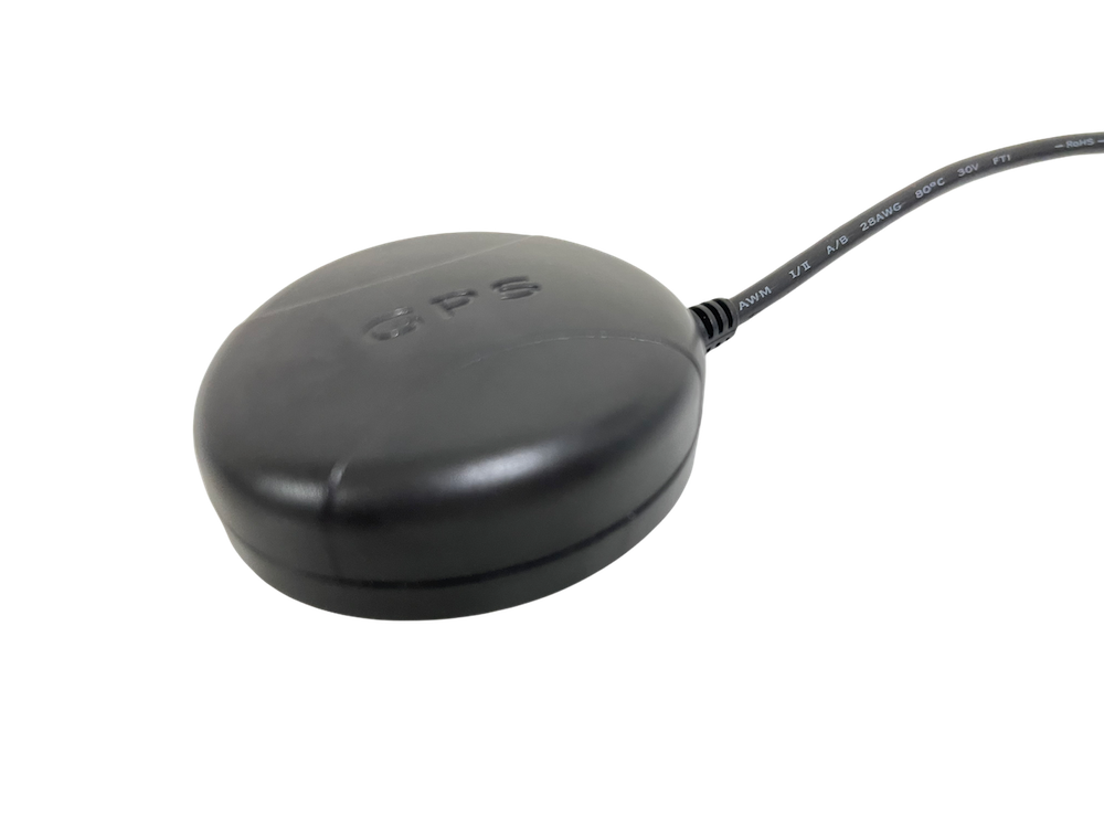 GPS device with a black oval shape and a cable attached.