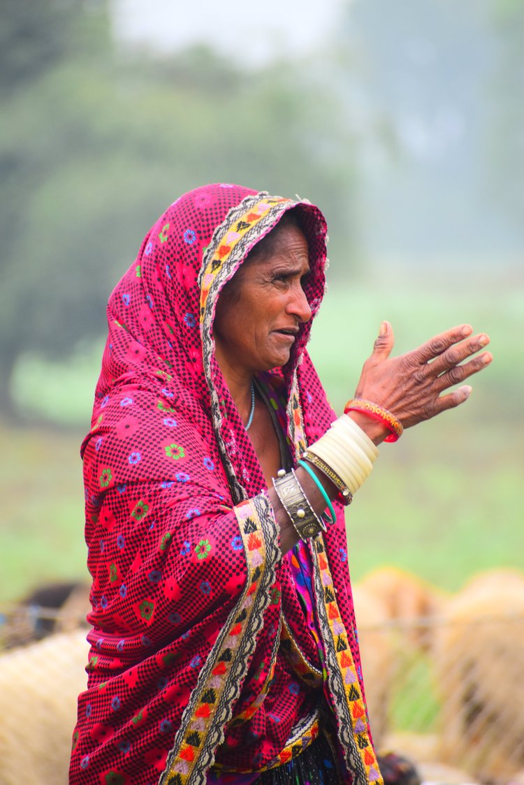 Elderly woman in colorful traditional attire