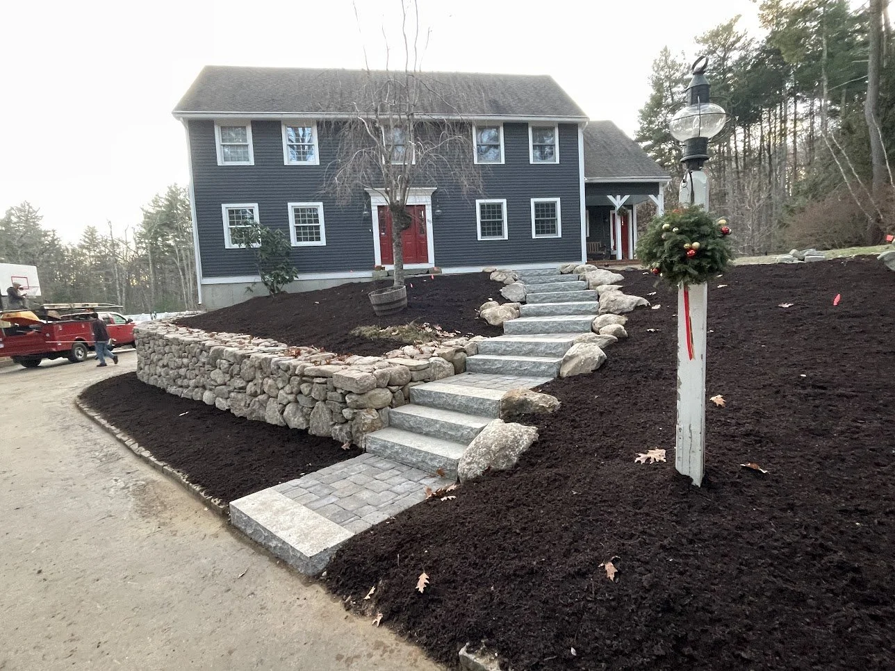 Stone stairs retaining wall new garden beds.JPG