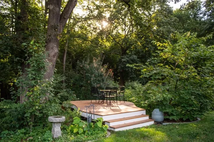 Native Backyard Garden with a Custom Curved Deck.jpg