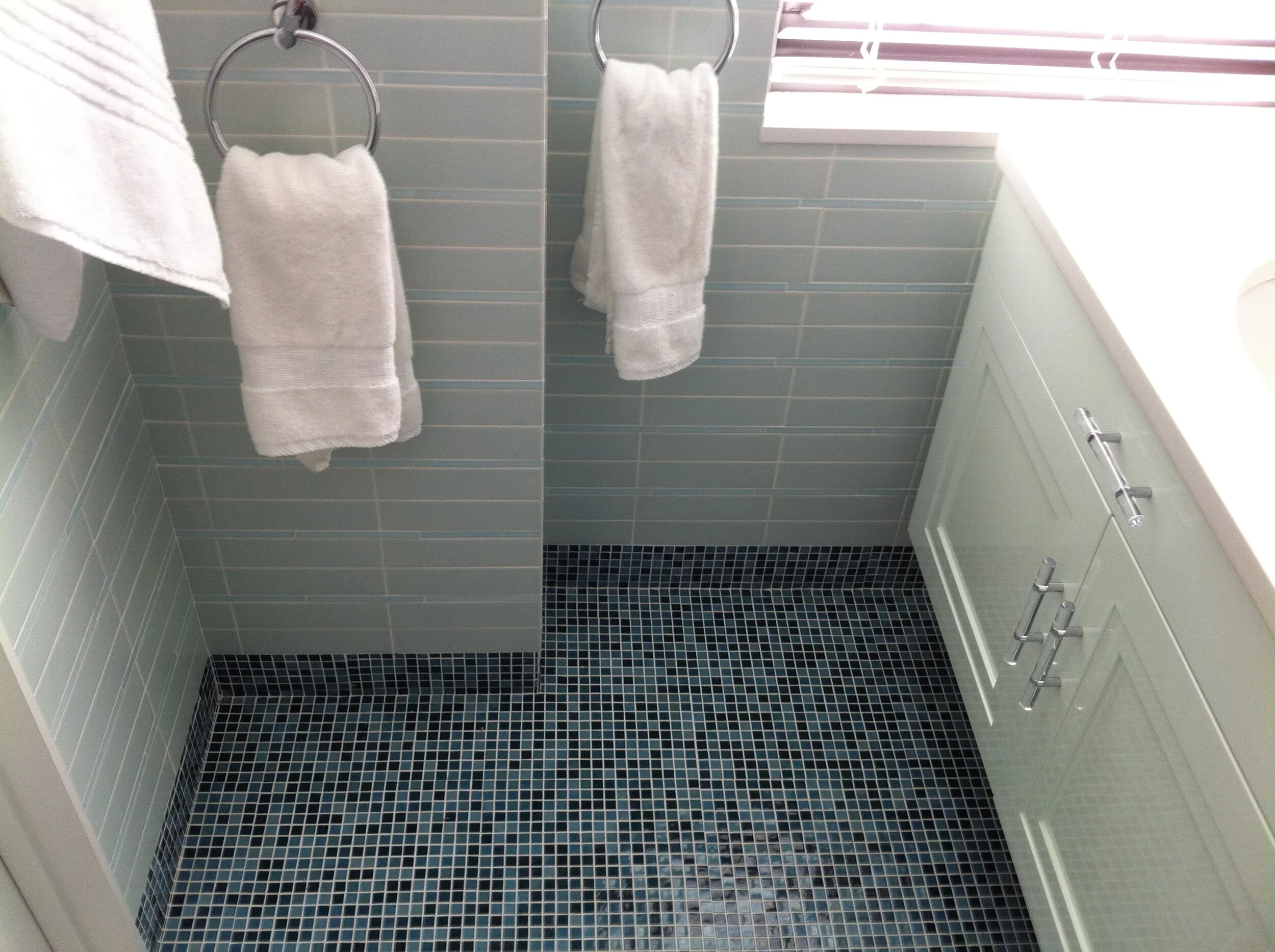 Ceramic tiles on wall and ceramic mosaic tiles on the floor 