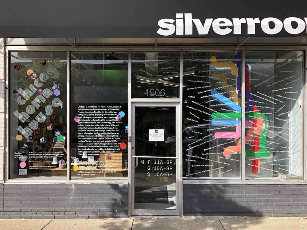  Front window of the Silverroom installation. White text is around the window, with a large graphic CTA map on the right window.  