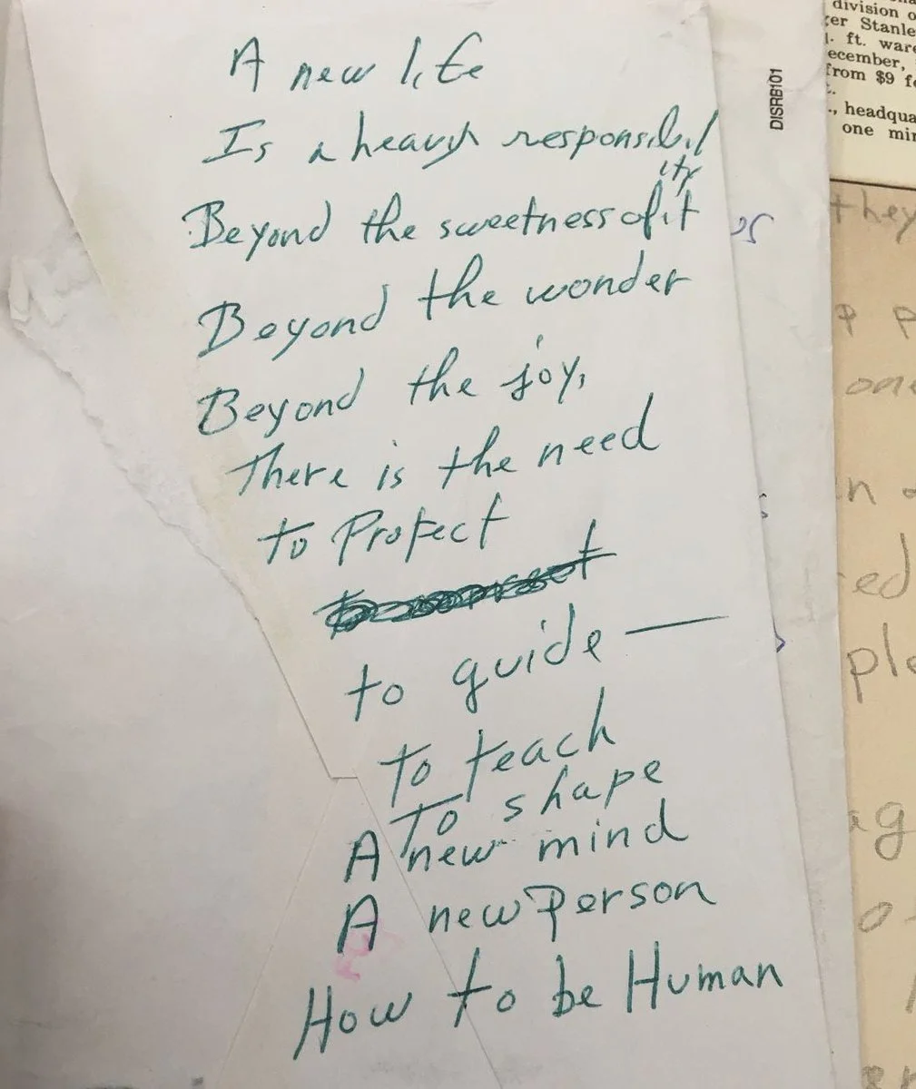 A poem written in green pen ink in Octavia Butler’s handwriting on the back of an envelope.