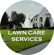 Sign for lawn care services with a white house and water fountain in the background