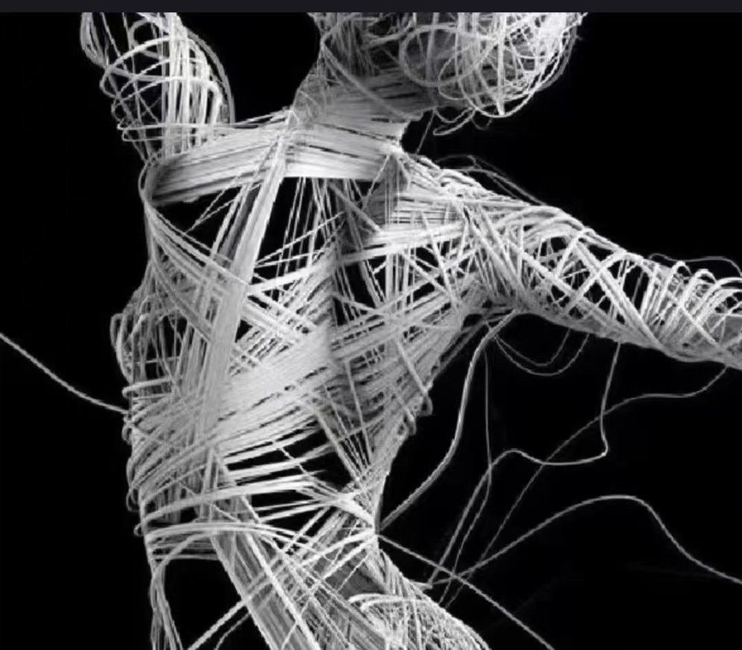 image of a dancing figure made of string.