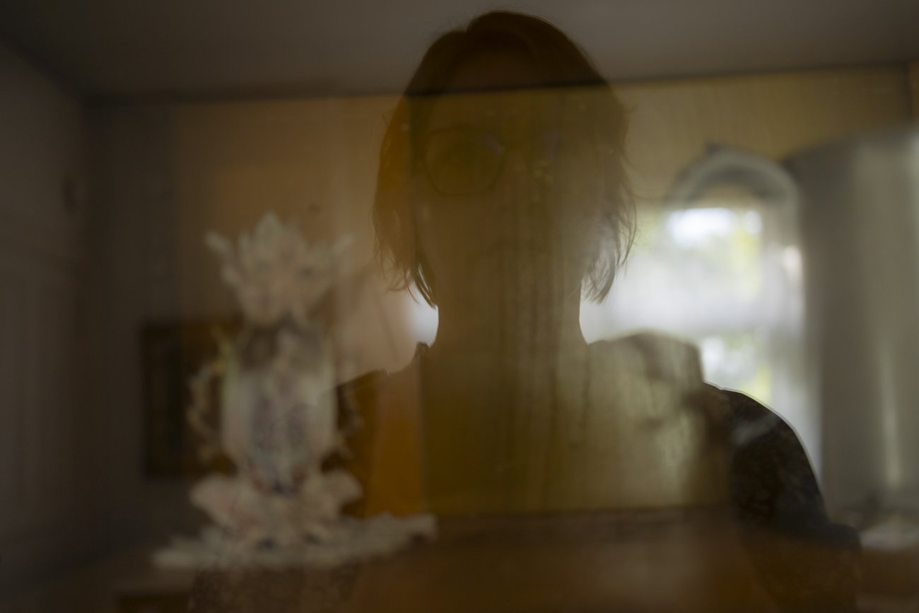 Through a Glass, Darkly