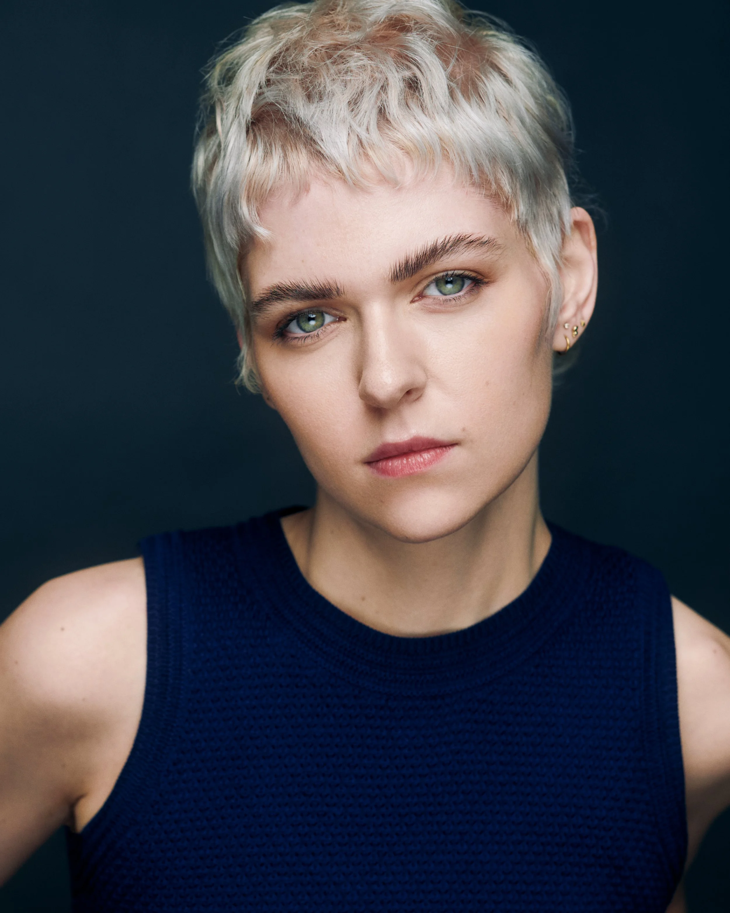 Moody headshot of actor Eddy Grace