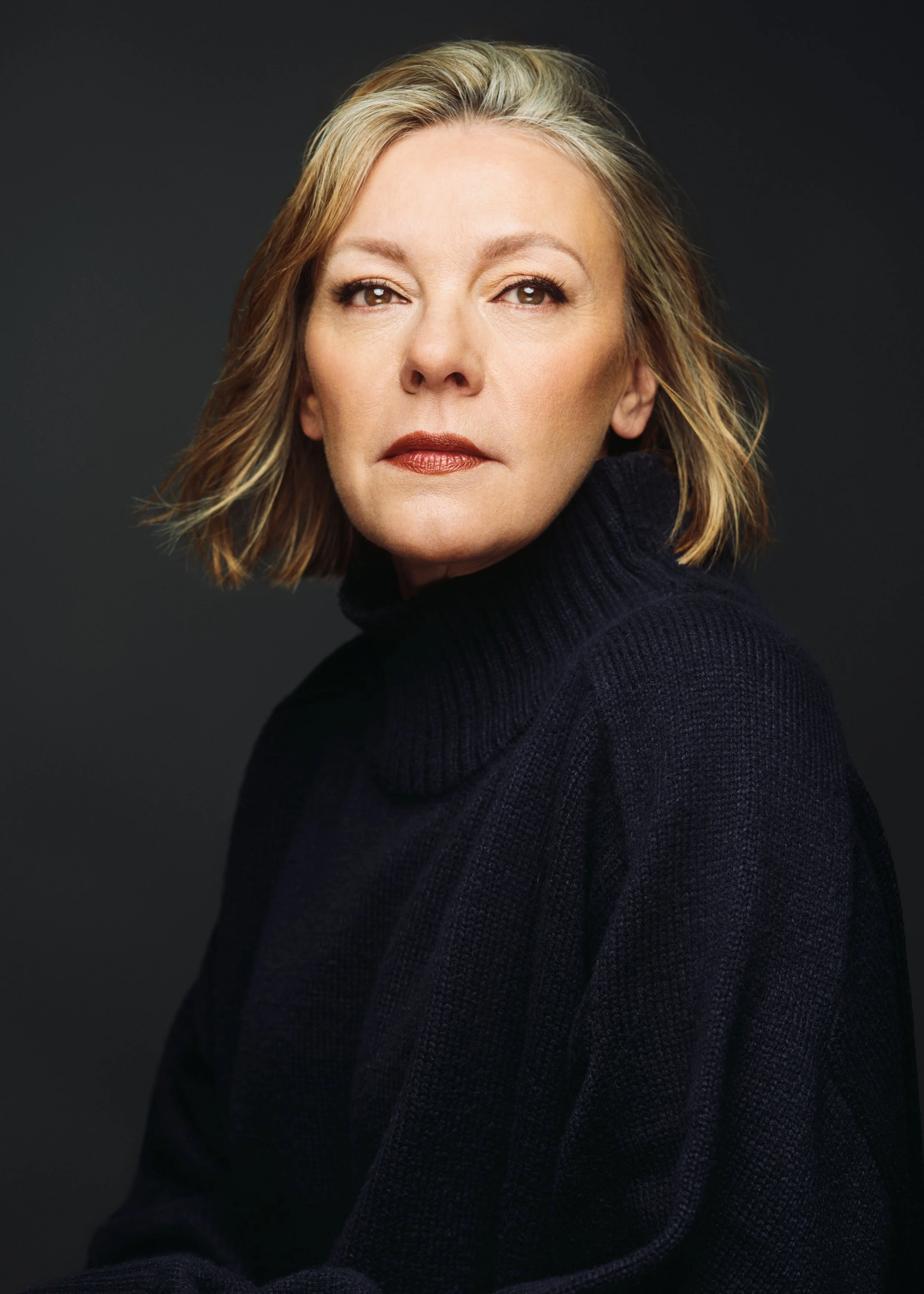 High contrast and editorial headshot of executive Audra Tuskes