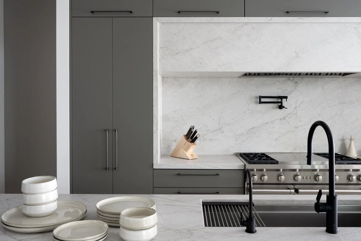 Intentional contrasts and quiet moments of pattern add dimension without overwhelming the serenity of the space. Every finish and furnishing was selected to feel cohesive yet collected- refined but never precious. The result is a canal-front home tha