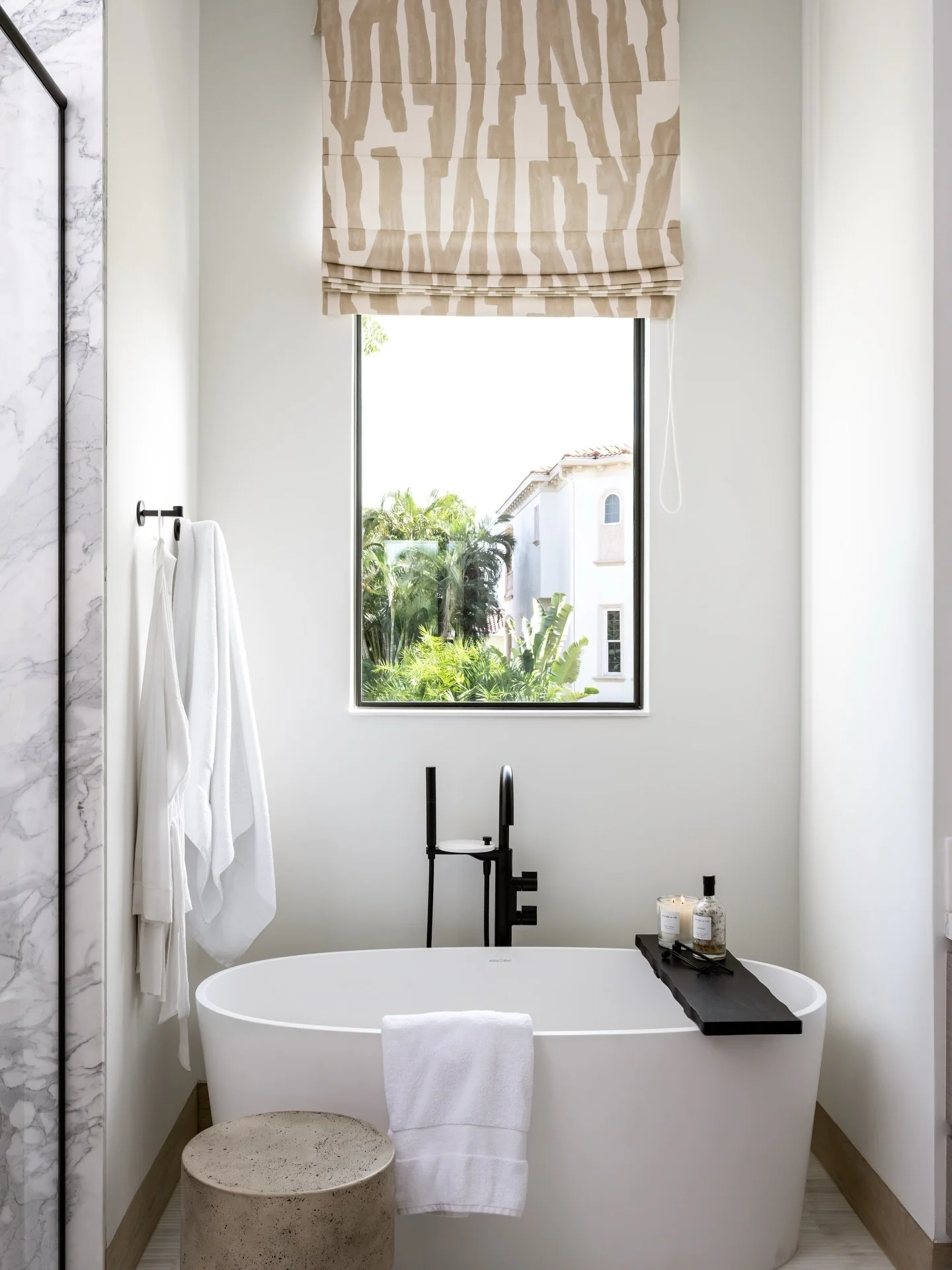 Designed as a private sanctuary, this Primary Bath pairs dramatic marble with warm wood tones for a look that is both elegant and balanced.

Project: Halyard
Designer: @chloeweatherford 
Photographer: @thelaurahenry 

#PrimaryBath
#DesignInspo
#Custo