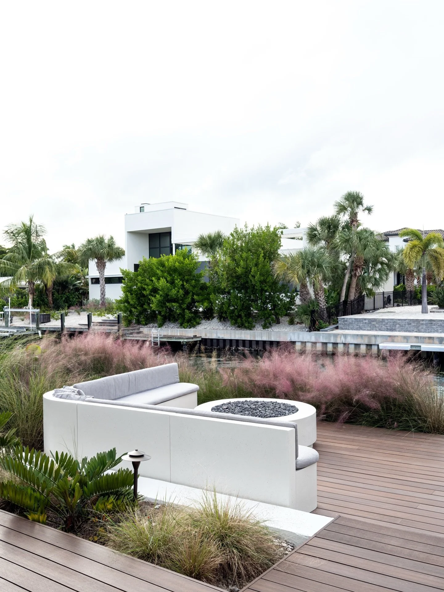 Designed for slow mornings, sunset gatherings, and everything in between. A custom seating area designed for conversation and connection adds warmth to this modern waterfront setting. 

Project: Halyard
Designer: @chloeweatherford 
Photographer: @the