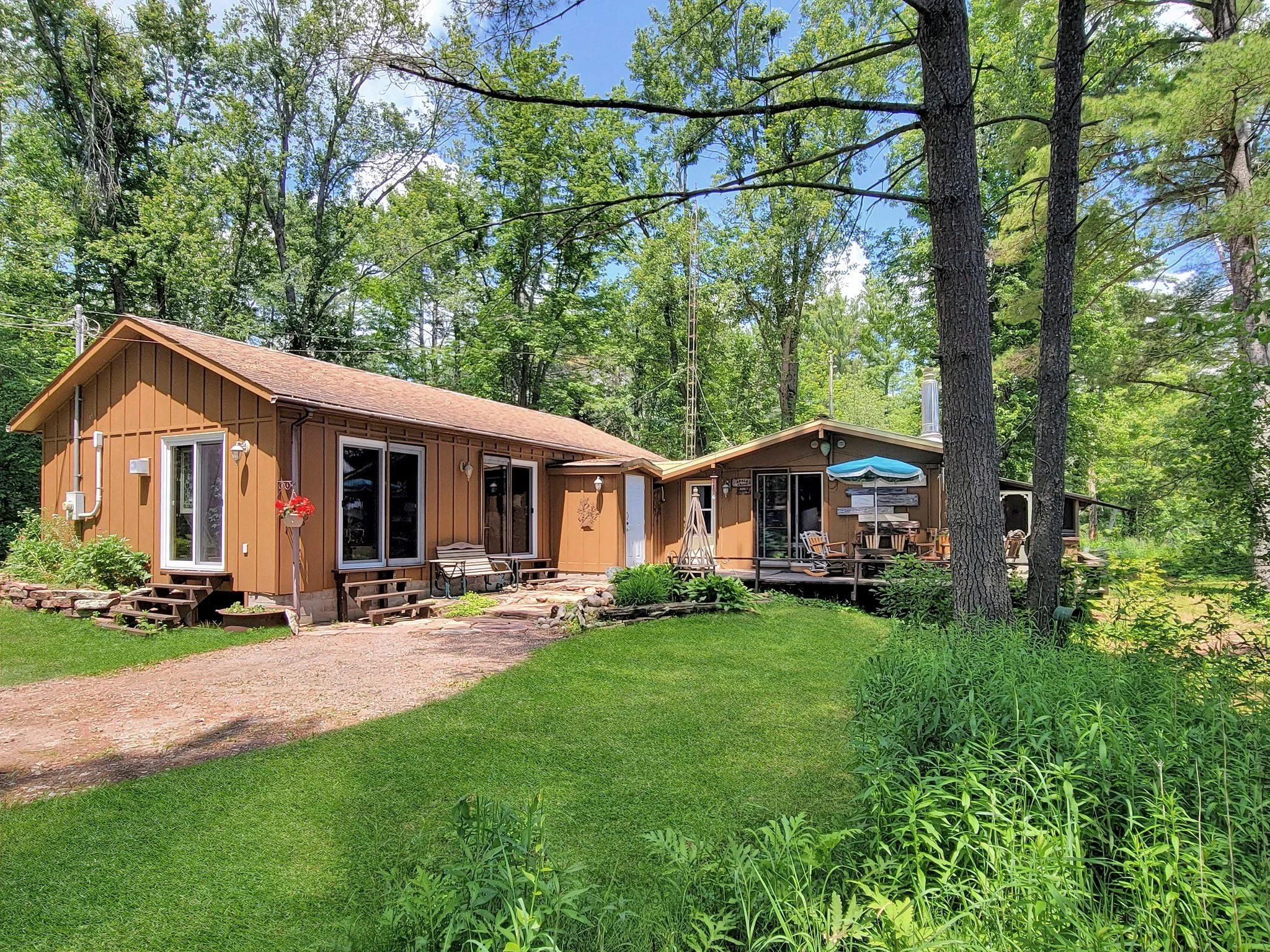 If a quiet, soft life immersed in the natural world is what you're in search of, let us be the first to congratulate you - you've found it. Here, at 396 North Shore Road.

Enveloped by the 82,000+ acres of The Queen Elizabeth II Wildlands Provincial 