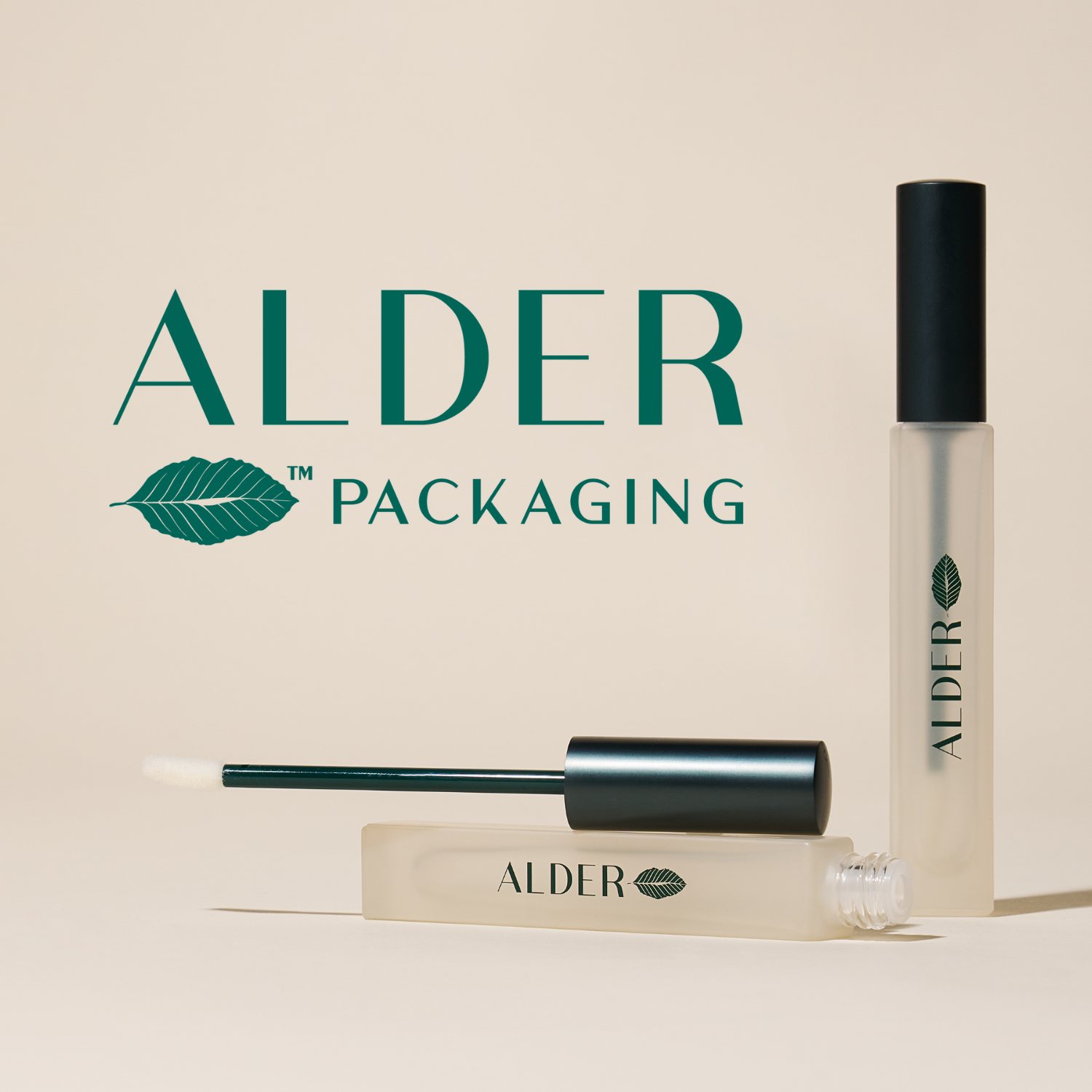 A cosmetics product with an ALDER branding, featuring two clear spray bottles with black caps and a white applicator with a roll-on ball, all branded with the ALDER logo and a green leaf.