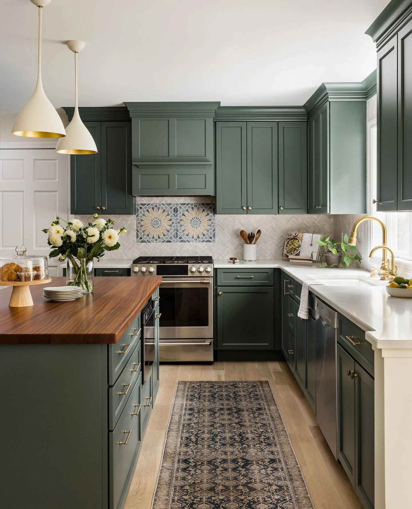 The beauty of a space is often found in the details. From the handcrafted tile focal point behind the range to the warmth of walnut surfaces and brass accents, each element was chosen to bring depth, texture, and personality to this kitchen.⁠
⁠
We&rs