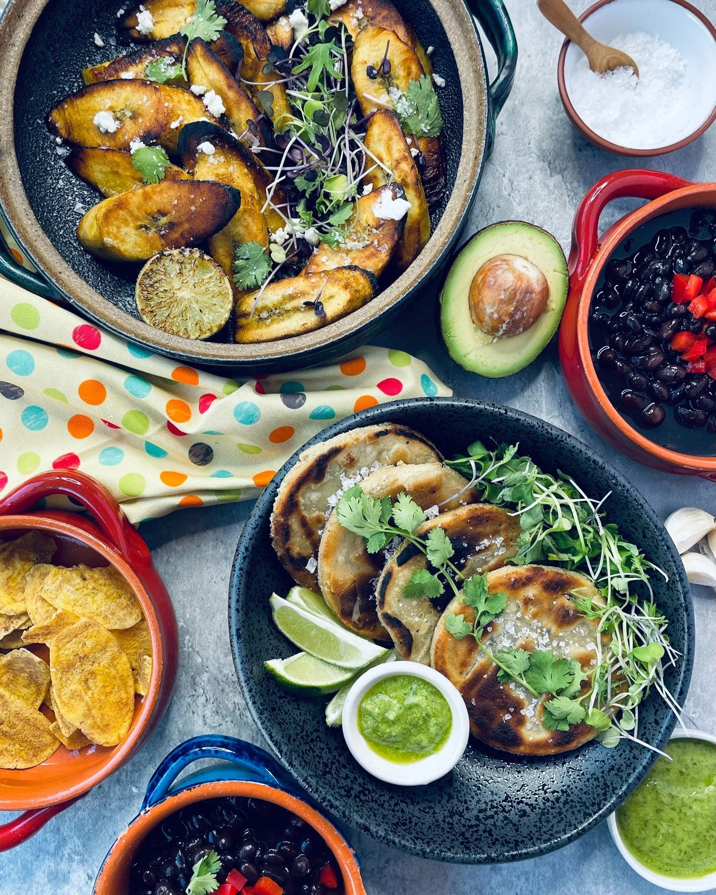 We love a classic holiday roast, but adding a little variety can make the season even more delish. What &ldquo;non-traditional&rdquo; holiday meals do you love? Share yours below!
Pictured: pupusas, fried plantains, black beans, and cilantro sauce.