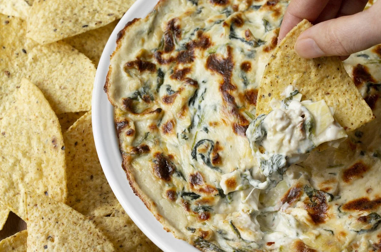 Hot spinach artichoke dip with tortilla chips