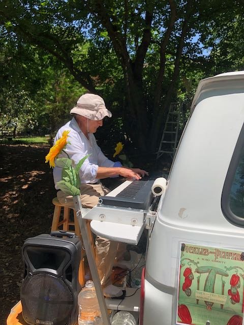  Dr. Thump played ragtime tunes during the garden tours and the bike rally.   photo: Bart King 