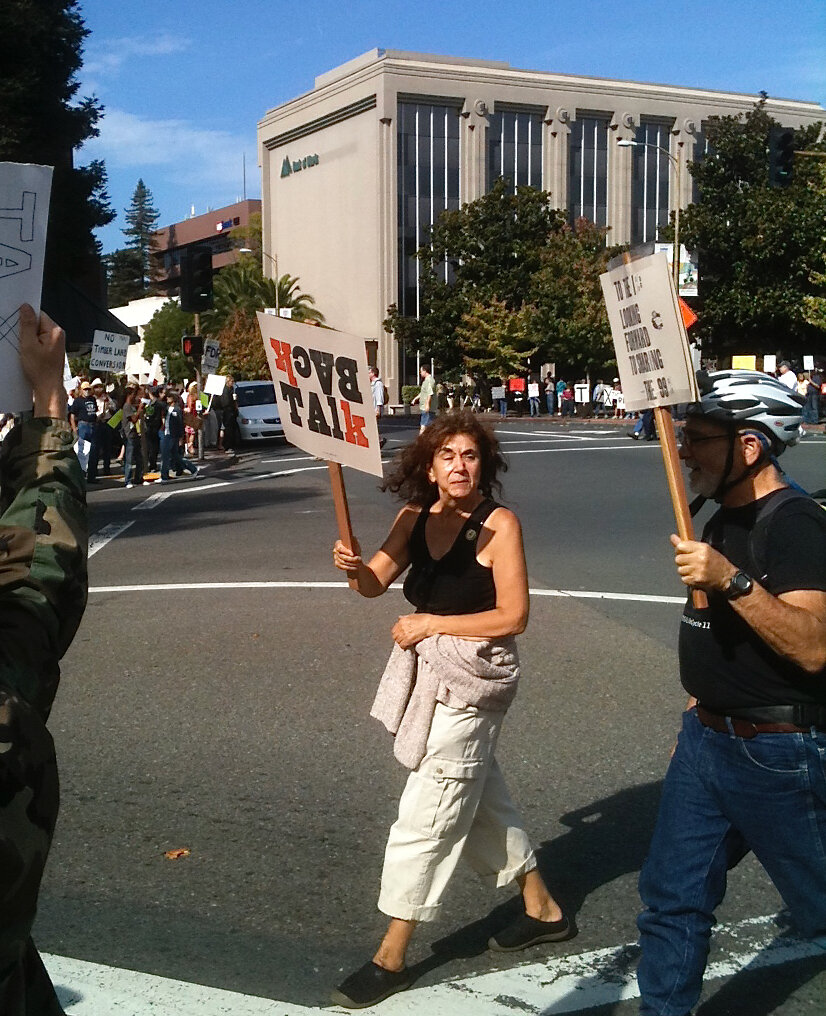 judi g. & Richard Burg protesting methinks