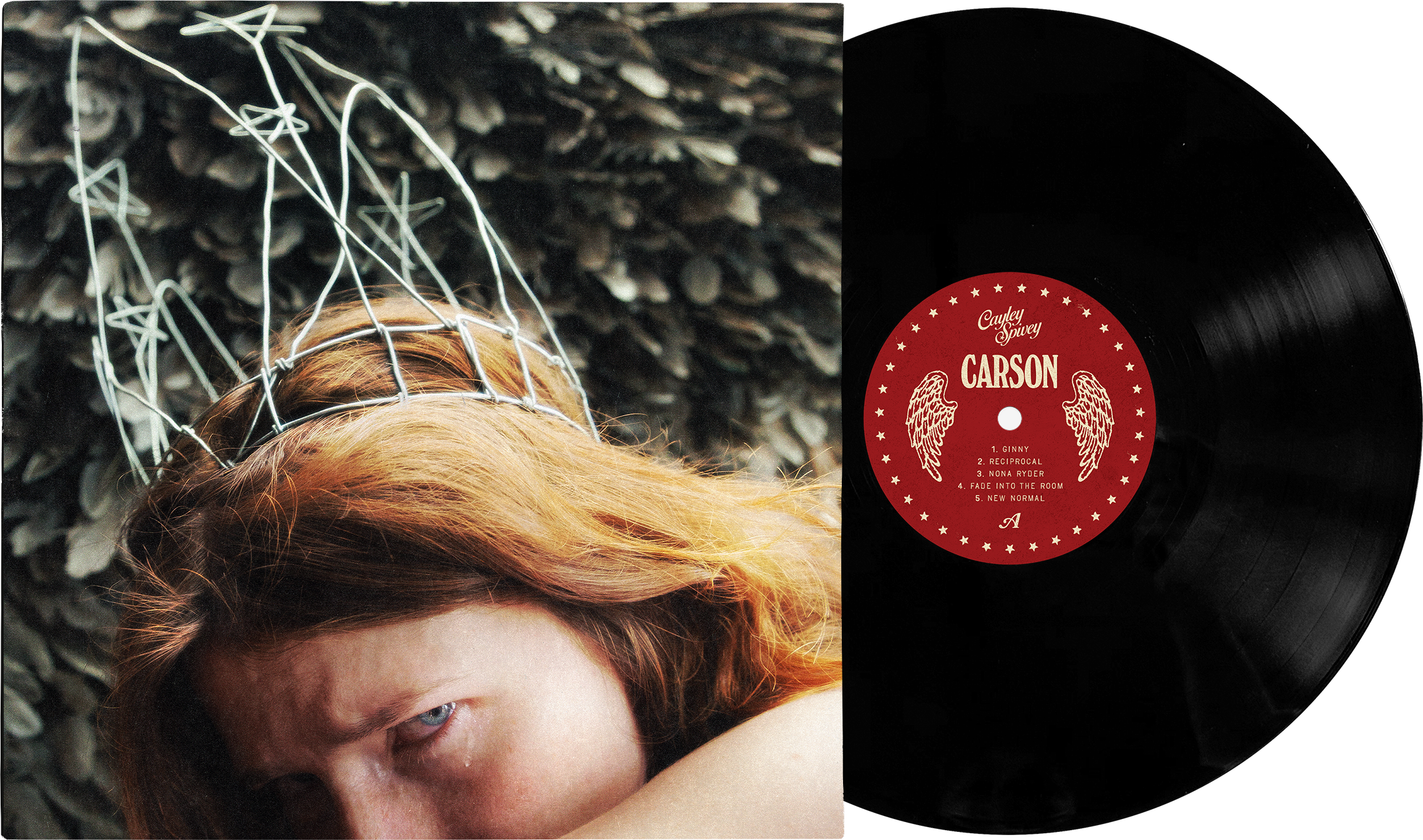 Close-up of a person's face with red hair lying on a dark textured surface, with a vinyl record partially covering their face. The record label is red with white text. Carson vinyl created by Cayley Spivey.
