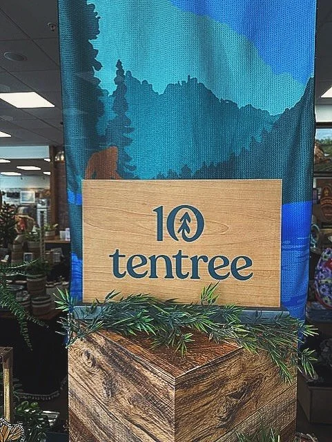 Can you spot Sasquatch at Walk in the Woods? 👣👀 @walk_in_the_woods_mount_dora is stepping into the new season with fresh POP and a new window featuring @tentree 🌲🌷🌼