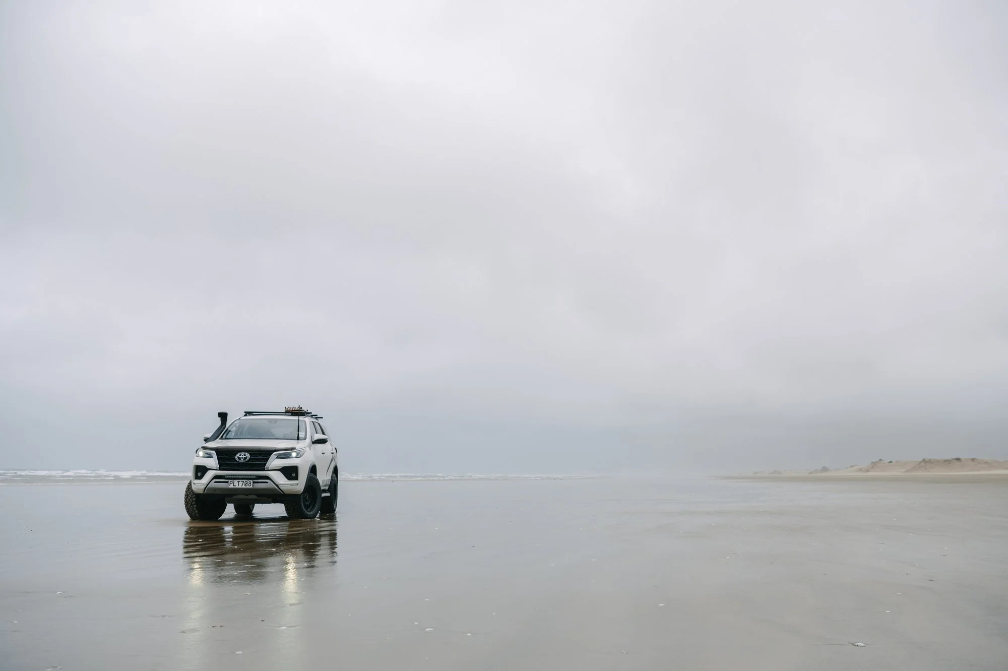 One of my favourite stretches of beach in New Zealand - 90 Mile Beach. Even on a gloomy day it's hard to beat. 

"It's called 90-mile beach, because it's exactly 55 miles long. I don't understand that either." - Jeremey Clarkson. And our fi