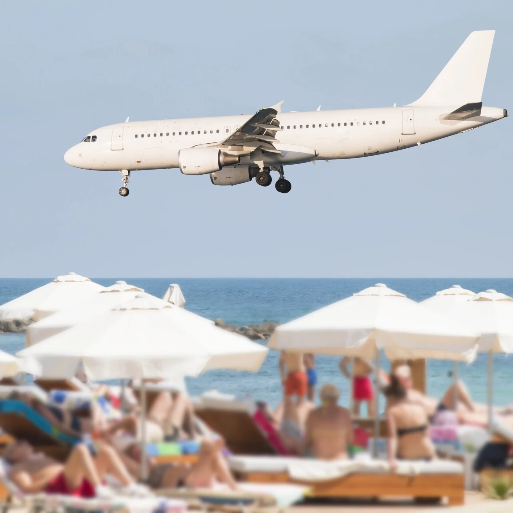 Plane over beach