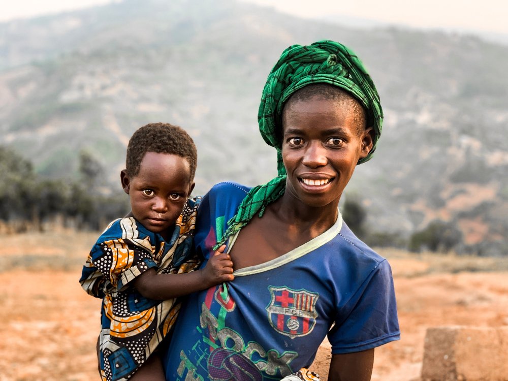 A Rwandan woman and child