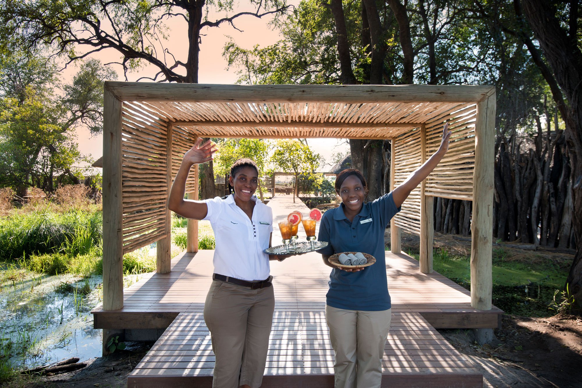 Botswana-Nxabega-Okavango-Tented-Camp-Staff-welcoming-guest-arrival.jpg