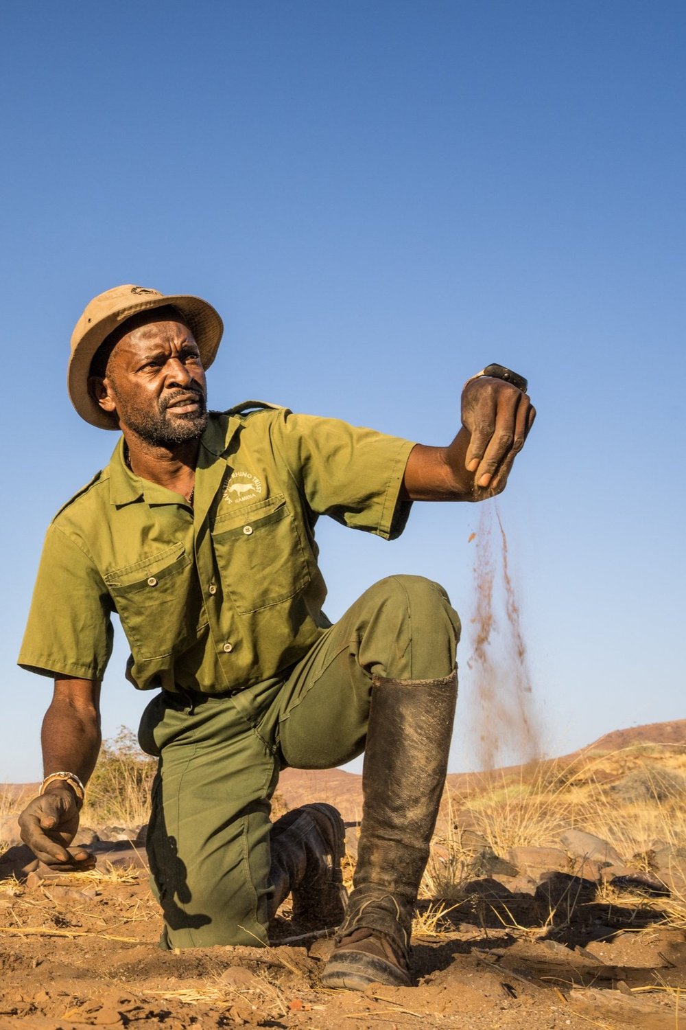Save the Rhino Trust ranger investigating ground in Namibia