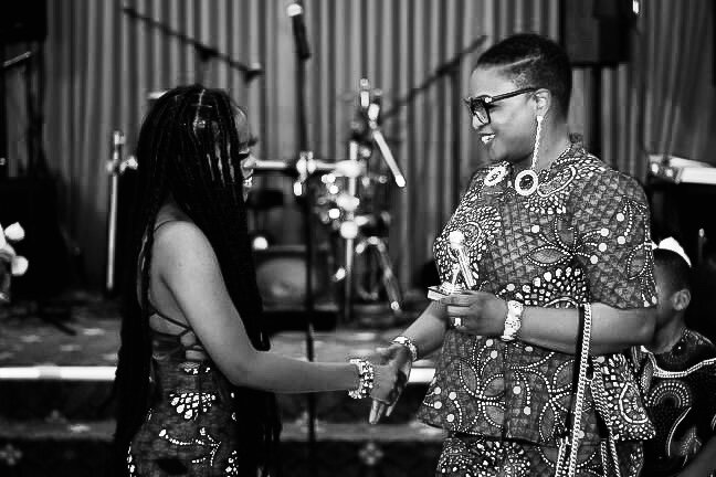 Queen Drie receiving award of BEST FEMALE ACT at Chicago Ankarafest 2021.