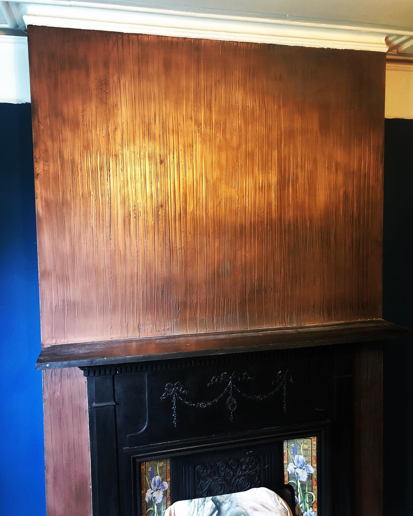 Liquid metal fireplace 🔥 I probably won&rsquo;t win any awards for photography anytime soon #gsk_venetian_plastering #liquidmetalfinishes #fireplace #liss #lmfx #copper #hampshire #venetianplaster #bespoke #oneofakind